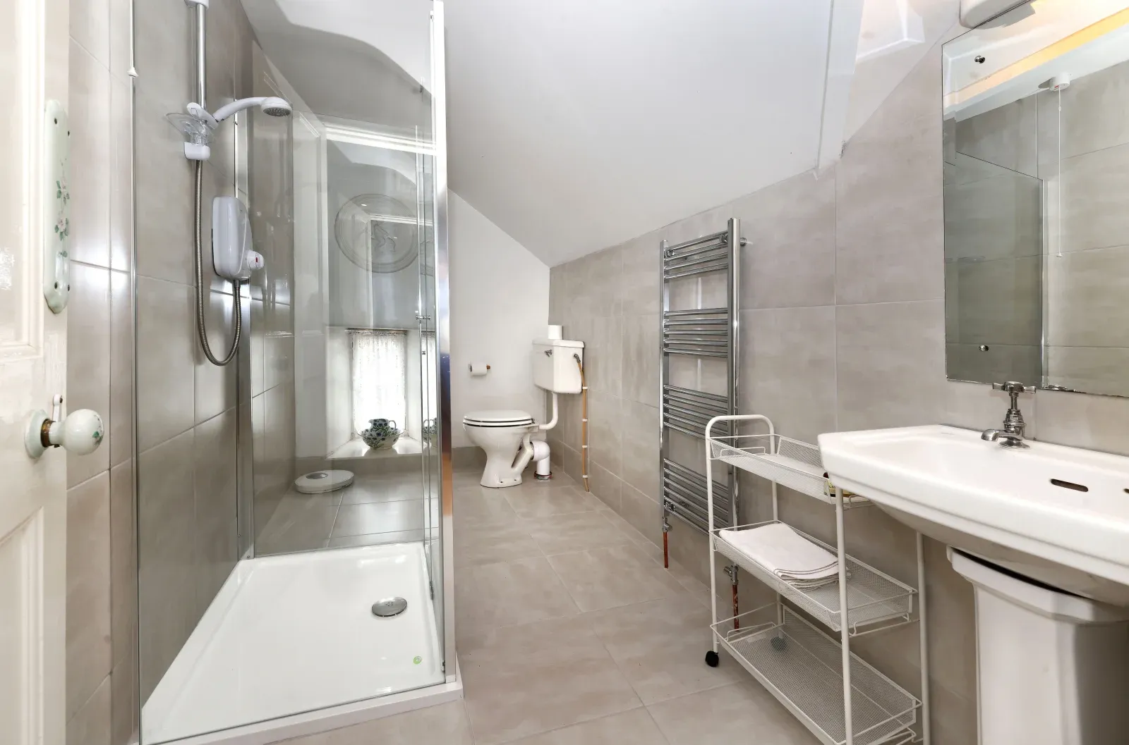 Shower room shared by bedrooms three and four